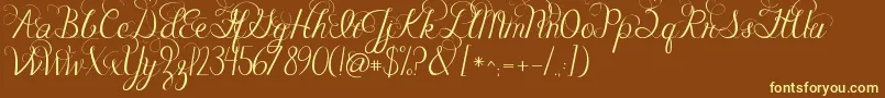Jandacelebrationscript Font – Yellow Fonts on Brown Background