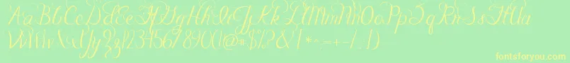 Jandacelebrationscript-fontti – keltaiset fontit vihreällä taustalla