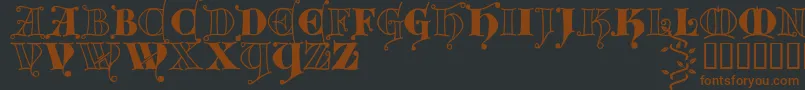 Kingthingsversalis-fontti – ruskeat fontit mustalla taustalla