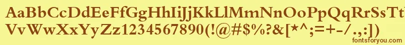 フォントKuriakosBlackSsiBold – 茶色の文字が黄色の背景にあります。