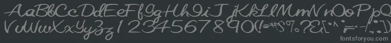 フォントElastictrainfont59Bold – 黒い背景に灰色の文字
