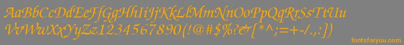 フォントChanceryScriptSsiItalic – オレンジの文字は灰色の背景にあります。