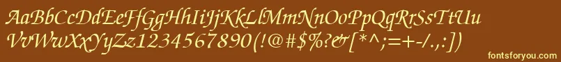 ChanceryScriptSsiItalic-fontti – keltaiset fontit ruskealla taustalla