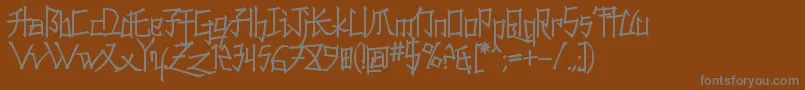 Konfuciuz-Schriftart – Graue Schriften auf braunem Hintergrund