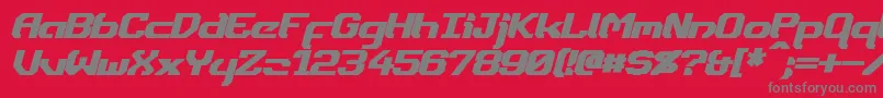 フォントDynothermBoldItalic – 赤い背景に灰色の文字