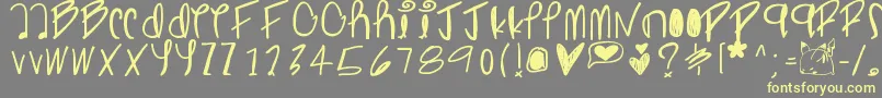 Ghostginger Font – Yellow Fonts on Gray Background