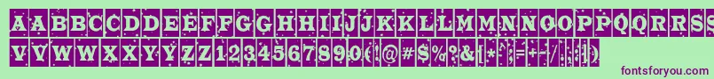 フォントATrianglercmstnt – 緑の背景に紫のフォント