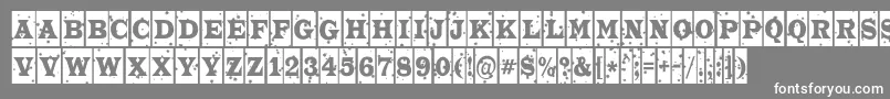 ATrianglercmstnt-fontti – valkoiset fontit harmaalla taustalla