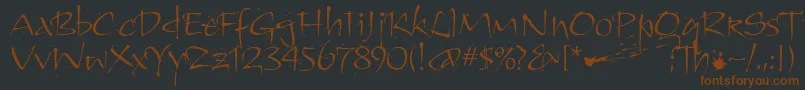 KendoitcTt-Schriftart – Braune Schriften auf schwarzem Hintergrund