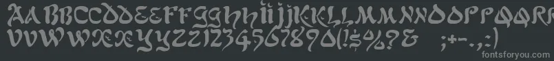 GeScimscript-fontti – harmaat kirjasimet mustalla taustalla