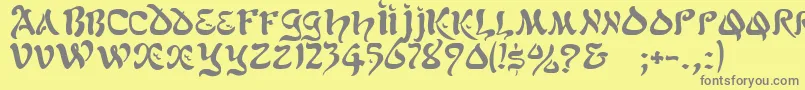 フォントGeScimscript – 黄色の背景に灰色の文字