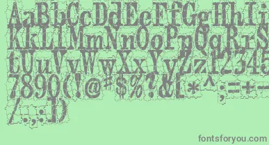 PuzzlefaceLeMonde font – Gray Fonts On Green Background