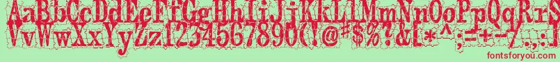 PuzzlefaceLeMonde-Schriftart – Rote Schriften auf grünem Hintergrund