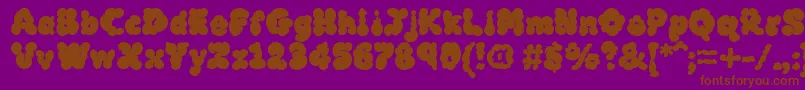 Czcionka MckloudBlack – brązowe czcionki na fioletowym tle