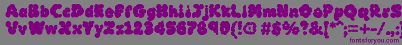Czcionka MckloudBlack – fioletowe czcionki na szarym tle
