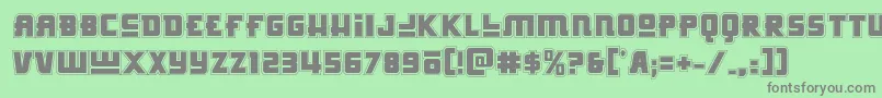 Hongkonghustleacad-fontti – harmaat kirjasimet vihreällä taustalla