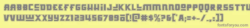 フォントHongkonghustleacad – 黄色の背景に灰色の文字