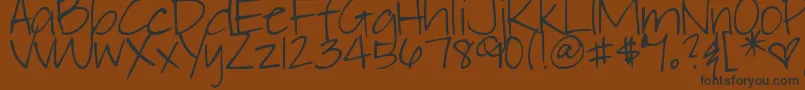 DjbElliephont Font – Black Fonts on Brown Background