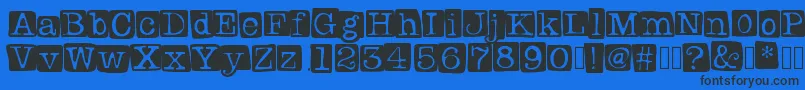 Badlystamped Font – Black Fonts on Blue Background