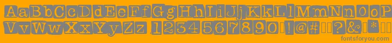 Badlystamped-Schriftart – Graue Schriften auf orangefarbenem Hintergrund