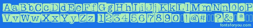Badlystamped Font – Green Fonts on Blue Background