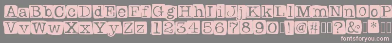 Badlystamped Font – Pink Fonts on Gray Background