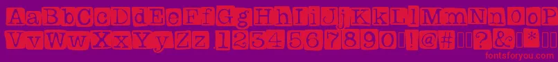 Czcionka Badlystamped – czerwone czcionki na fioletowym tle