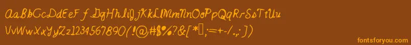 Catsintheclouds Font – Orange Fonts on Brown Background