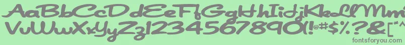 Fonte Japanscript911Bold – fontes cinzas em um fundo verde