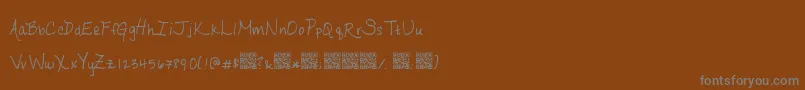 Ripeapricots Font – Gray Fonts on Brown Background
