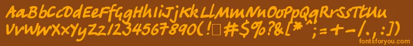 Tatianactt Font – Orange Fonts on Brown Background