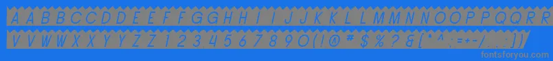 SfButtacupOblique-fontti – harmaat kirjasimet sinisellä taustalla