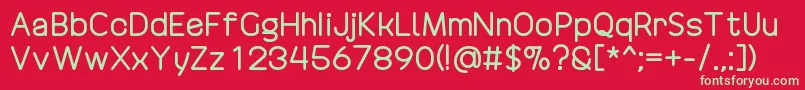 フォントDrakoheartRevofitDouble – 赤い背景に緑の文字