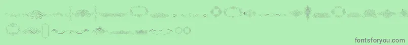 CalligraphiaLatinaFree Font – Gray Fonts on Green Background