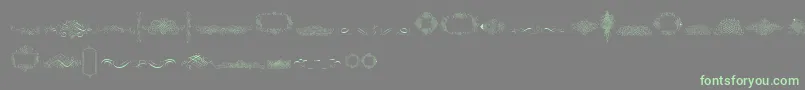 CalligraphiaLatinaFree Font – Green Fonts on Gray Background