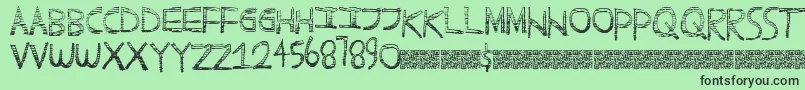 フォントScratchyfun – 緑の背景に黒い文字