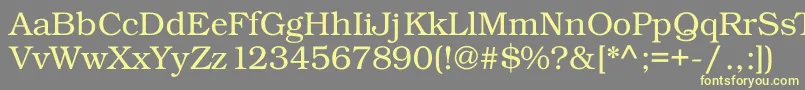 Kacstposter Font – Yellow Fonts on Gray Background