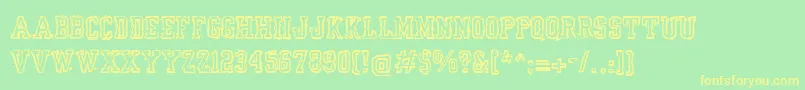 Yearbookmess Font – Yellow Fonts on Green Background