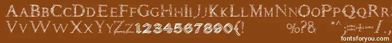 Daemonesque Font – White Fonts on Brown Background