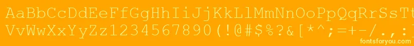 Więcej informacji o czcionce Wuzzy4 Czcionka Wuzzy4 – żółte czcionki na pomarańczowym tle