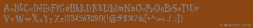 Więcej informacji o czcionce RocknrollTypoCollege Czcionka RocknrollTypoCollege – szare czcionki na brązowym tle