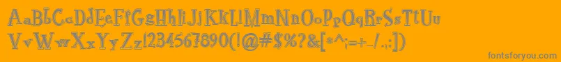 RocknrollTypoCollege-fontti – harmaat kirjasimet oranssilla taustalla