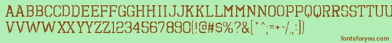 OctinspraypaintbrgRegular Font – Brown Fonts on Green Background