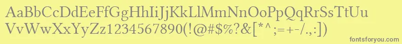 LinlibertineDr-fontti – harmaat kirjasimet keltaisella taustalla