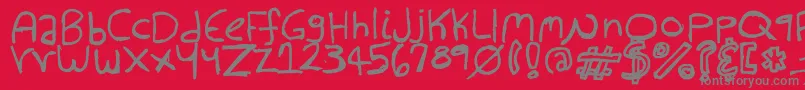 HollowHills-Schriftart – Graue Schriften auf rotem Hintergrund