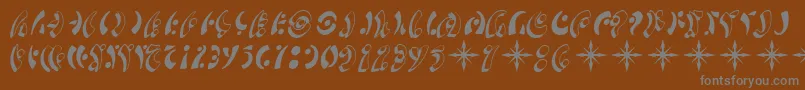 SfFedoraSymbols-fontti – harmaat kirjasimet ruskealla taustalla