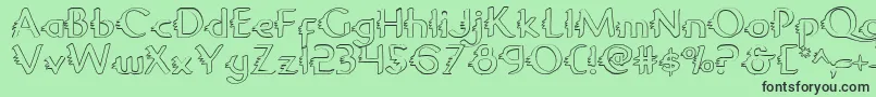 フォントGypsyRoadOutline – 緑の背景に黒い文字