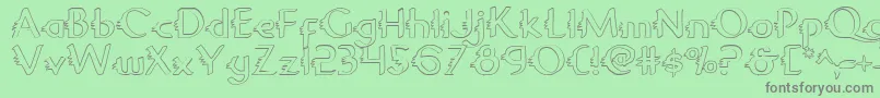 フォントGypsyRoadOutline – 緑の背景に灰色の文字