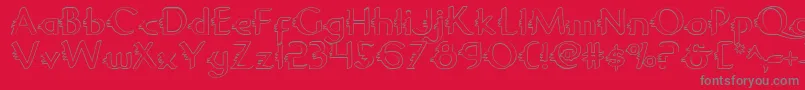 GypsyRoadOutline-fontti – harmaat kirjasimet punaisella taustalla
