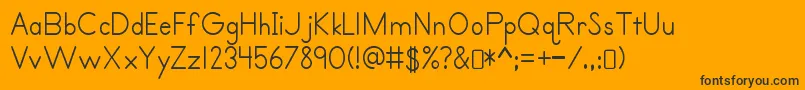 Primerprint Regular Font – Black Fonts on Orange Background